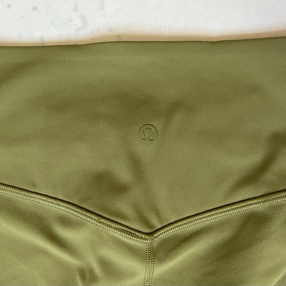 NWT Lululemon Nulu and Crisscross Mesh Stirrup Tight Leggings, Bronze Green - Picture 9 of 15
